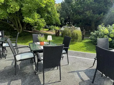 Ein Garten an der Unterkunft Harzhotel Warnstedter Krug