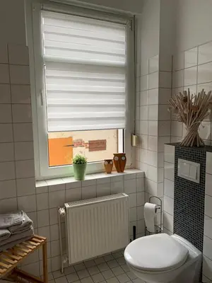 Ein Badezimmer in der Unterkunft Albertine