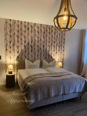 Ein Bett oder Betten in einem Zimmer der Unterkunft Auszeit-Appartement Wernigerode