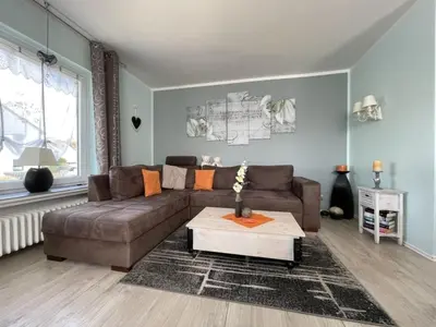 Ein Sitzbereich in der Unterkunft Ferienhaus SweetHome