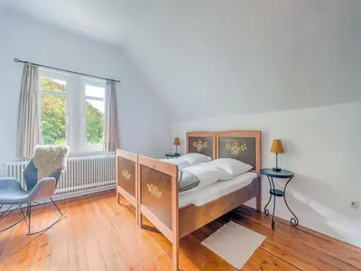 Ein Bett oder Betten in einem Zimmer der Unterkunft Rustic Apartment with Garden in Bad Harzburg Germany