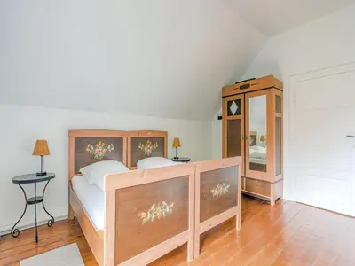 Ein Bett oder Betten in einem Zimmer der Unterkunft Rustic Apartment with Garden in Bad Harzburg Germany