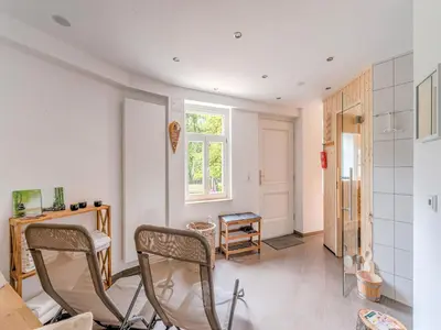 Ein Sitzbereich in der Unterkunft Rustic Apartment with Garden in Bad Harzburg Germany