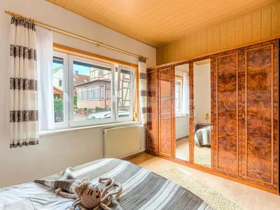 Ein Bett oder Betten in einem Zimmer der Unterkunft Ferienwohnung in der Nähe des Brockengipfels