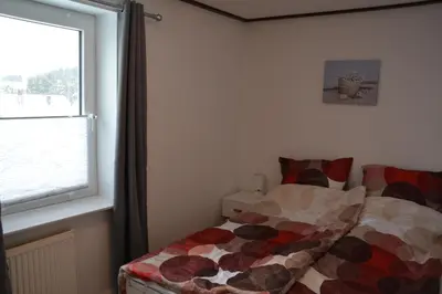 Ein Bett oder Betten in einem Zimmer der Unterkunft Ferienhaus sonniges Altenau Harz