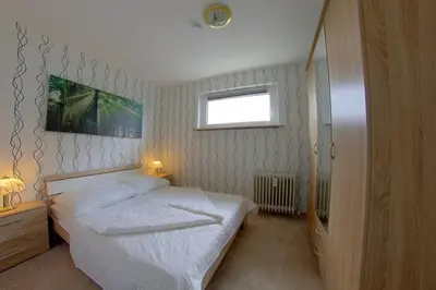 Ein Bett oder Betten in einem Zimmer der Unterkunft Apartment 283