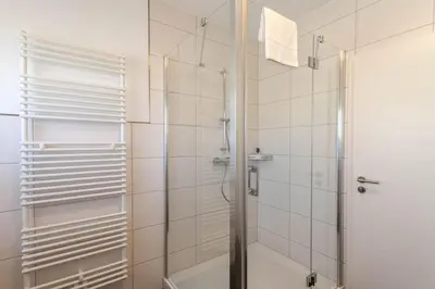 Ein Badezimmer in der Unterkunft Ferienhaus Wanderzeit mit Sauna, Garten und Grill
