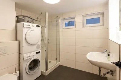 Ein Badezimmer in der Unterkunft Ferienhaus Wanderzeit mit Sauna, Garten und Grill