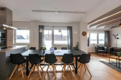 Ein Sitzbereich in der Unterkunft Ferienhaus Wanderzeit mit Sauna, Garten und Grill