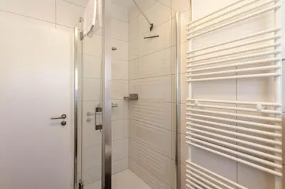 Ein Badezimmer in der Unterkunft Ferienhaus Wanderzeit mit Sauna, Garten und Grill