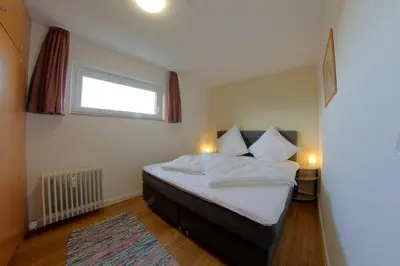 Ein Bett oder Betten in einem Zimmer der Unterkunft Apartment 449