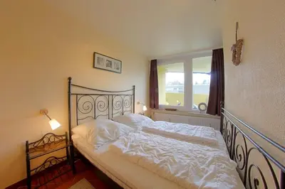 Ein Bett oder Betten in einem Zimmer der Unterkunft Apartment 219