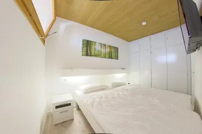 Ein Bett oder Betten in einem Zimmer der Unterkunft Apartment 225