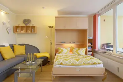 Ein Bett oder Betten in einem Zimmer der Unterkunft Apartment 239