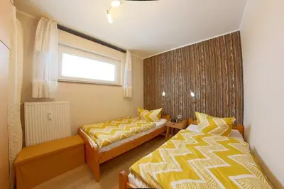Ein Bett oder Betten in einem Zimmer der Unterkunft Apartment 239