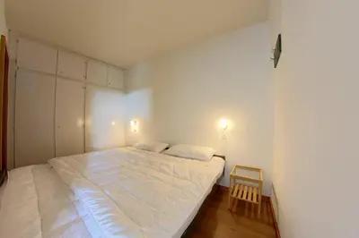 Ein Bett oder Betten in einem Zimmer der Unterkunft Apartment 244