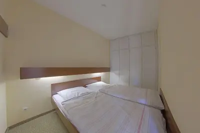 Ein Bett oder Betten in einem Zimmer der Unterkunft Apartment 257