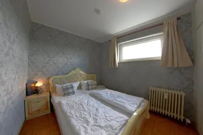 Ein Bett oder Betten in einem Zimmer der Unterkunft Apartment 260 Cowboy & Indianer