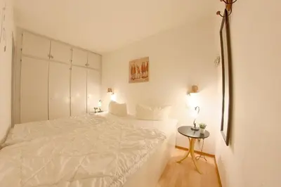 Ein Bett oder Betten in einem Zimmer der Unterkunft Apartment 272