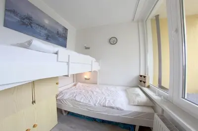 Ein Bett oder Betten in einem Zimmer der Unterkunft Apartment 272