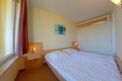 Ein Bett oder Betten in einem Zimmer der Unterkunft Apartment 277