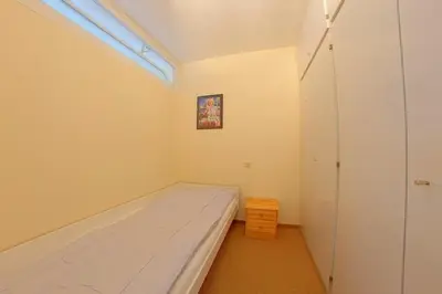 Ein Bett oder Betten in einem Zimmer der Unterkunft Apartment 277