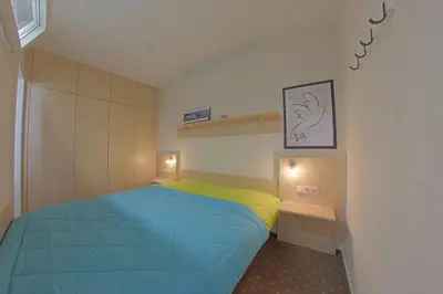 Ein Bett oder Betten in einem Zimmer der Unterkunft Apartment 281