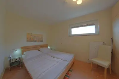 Ein Bett oder Betten in einem Zimmer der Unterkunft Apartment 343