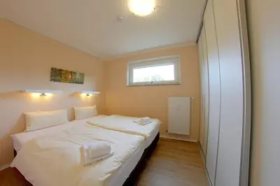 Ein Bett oder Betten in einem Zimmer der Unterkunft Apartment 410