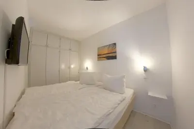Ein Bett oder Betten in einem Zimmer der Unterkunft Apartment 471