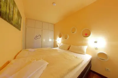Ein Bett oder Betten in einem Zimmer der Unterkunft Apartment 512