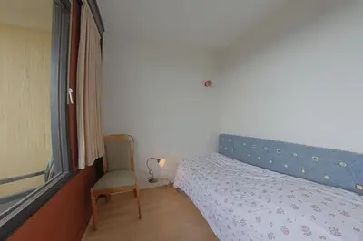 Ein Bett oder Betten in einem Zimmer der Unterkunft Apartment 515