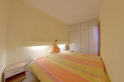 Ein Bett oder Betten in einem Zimmer der Unterkunft Apartment 545