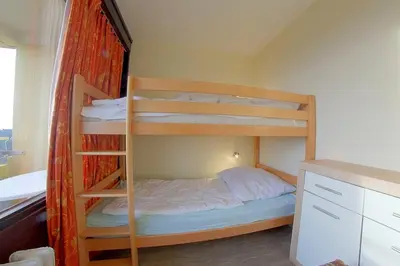 Ein Bett oder Betten in einem Zimmer der Unterkunft Apartment 545