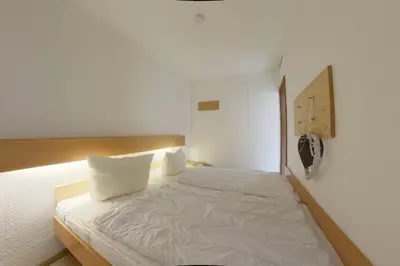 Ein Bett oder Betten in einem Zimmer der Unterkunft Apartment 564
