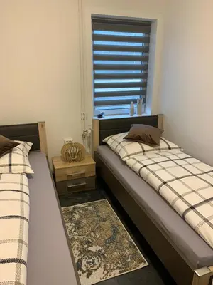Ein Bett oder Betten in einem Zimmer der Unterkunft Mariposa 4 incl Pool & Sauna