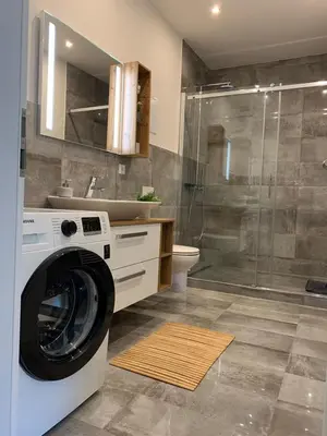 Ein Badezimmer in der Unterkunft Mariposa 4 incl Pool & Sauna