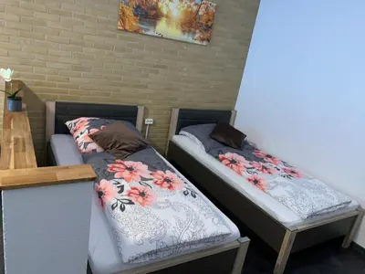 Ein Bett oder Betten in einem Zimmer der Unterkunft Mariposa 5 incl Pool & Sauna