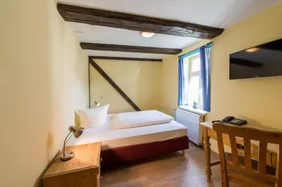 Ein Bett oder Betten in einem Zimmer der Unterkunft Maria Aurora