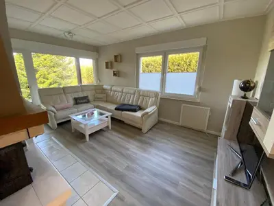 Ein Sitzbereich in der Unterkunft Die kleine Lodge, freistehend, direkte Waldlage, Terrasse, Garten, Grill, WLAN