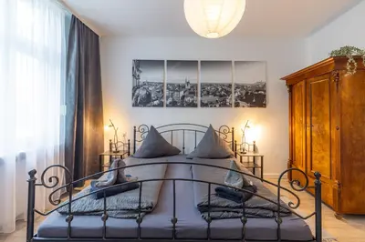 Ein Bett oder Betten in einem Zimmer der Unterkunft Ferienwohnung zur Vossbrücke