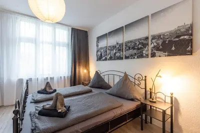 Ein Bett oder Betten in einem Zimmer der Unterkunft Ferienwohnung zur Vossbrücke