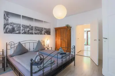 Ein Bett oder Betten in einem Zimmer der Unterkunft Ferienwohnung zur Vossbrücke