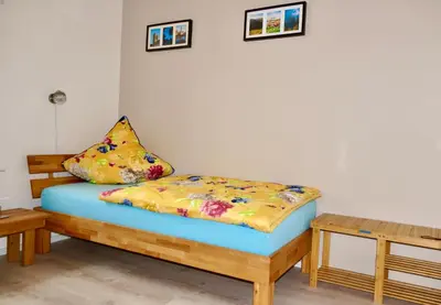 Ein Bett oder Betten in einem Zimmer der Unterkunft Ferienwohnung Ostard 1
