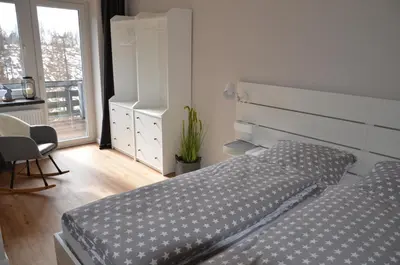 Ein Bett oder Betten in einem Zimmer der Unterkunft Harz-Butze
