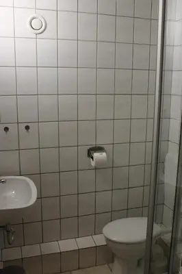 Ein Badezimmer in der Unterkunft Hotel und Campingstell und Zeltplatz an der Talsperre im Harz