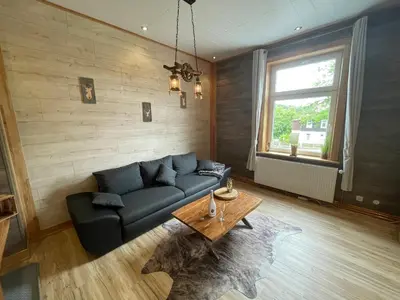 Ein Sitzbereich in der Unterkunft Ferienwohnung by Hell & Dunkel