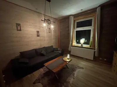 Ein Sitzbereich in der Unterkunft Ferienwohnung by Hell & Dunkel