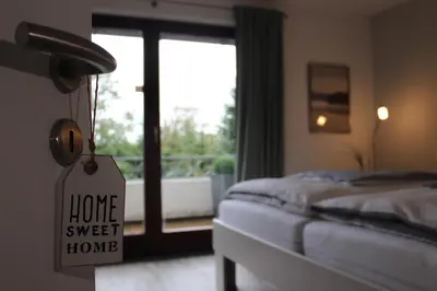 Ein Bett oder Betten in einem Zimmer der Unterkunft Quartier am Golfplatz