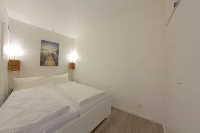 Ein Bett oder Betten in einem Zimmer der Unterkunft Apartment 478